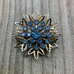 Flower Starburst Vintage Blue Rhinestone Gold Tone Brooch Pin